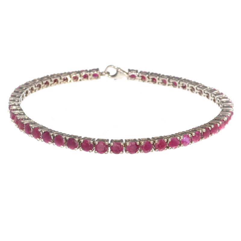 APP: 2.3k Fine Jewelry 9.60CT Ruby And Sterling Silver: Gov. File: H-20999 Fine Jewelry 9.60CT Ruby And Sterling Silver Tennis Bracelet Retail Replacement Value: $2.3K Asset Type: Bracelet Shipping: $19.95