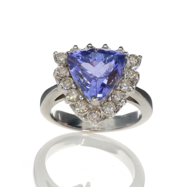 APP: 15.1k 14 kt. White Gold, 4.35CT Trillion Cut: Gov. File: 93296 14 kt. White Gold, 4.35CT Trillion Cut Tanzanite And 0.52CT Round Cut Diamond Ring Retail Replacement Value: $15.1K Asset Type: Ring Shipping: $19.95