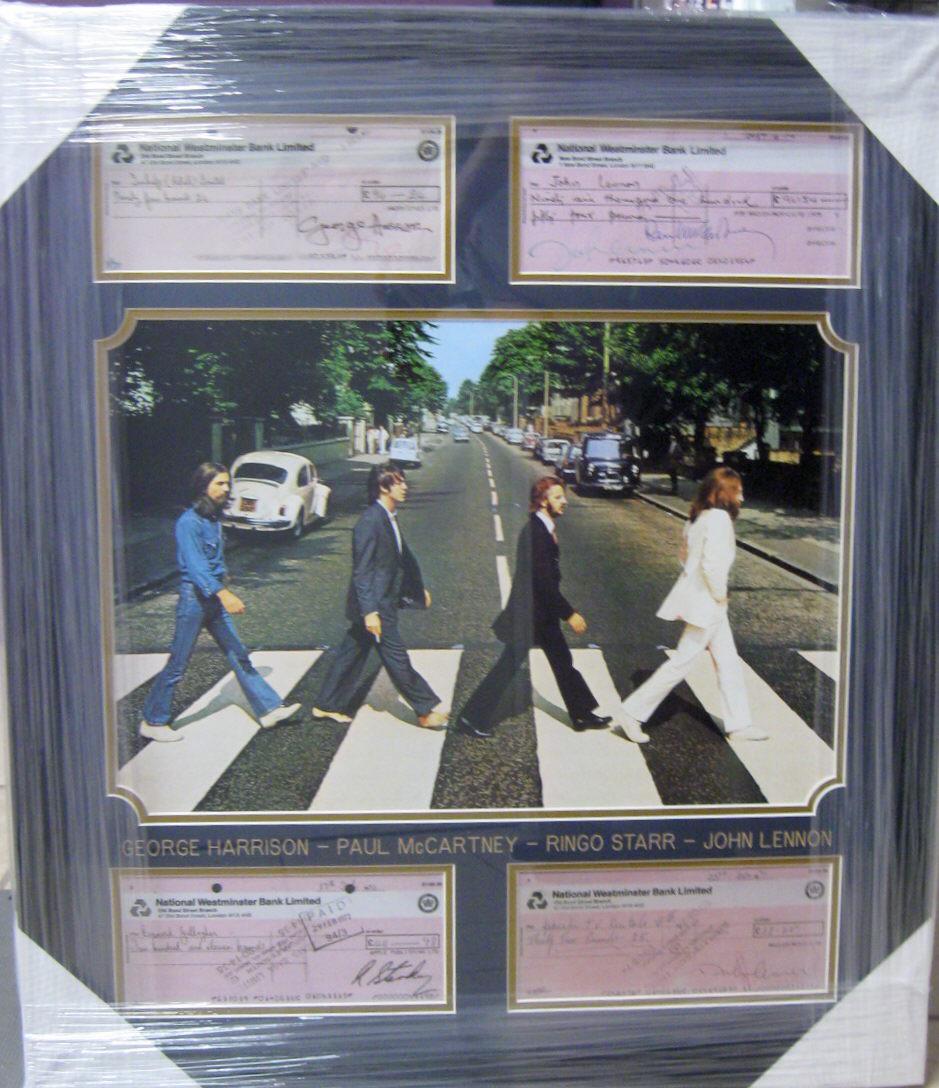 *Beatles Signed Copied Bank Checks Collage: Gov. File: M-14141 *Beatles Signed Copied Bank Checks Collage Asset Type: CollectableShipping: $29.95. Item may be pick up only, or require additional shipping charges due to weight or size.