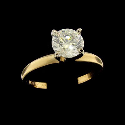 APP: 7.2k 14 kt. Gold, 0.96CT Diamond Ring