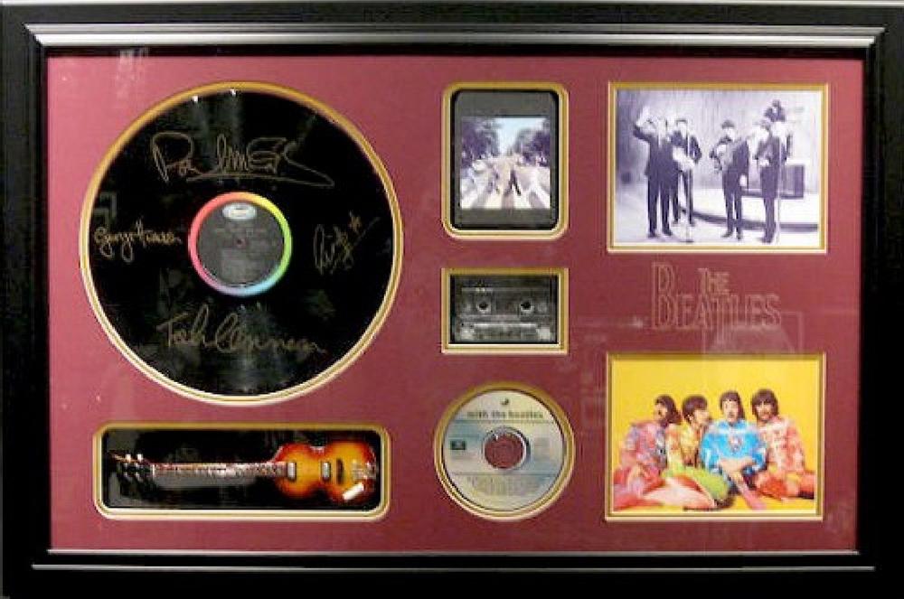 *Rare The Beatles Mini Guitar, Record, CD, and Cassette: Gov. File: M-19245 *Rare The Beatles Mini Guitar, Record, CD, and Cassette Museum Framed Collage - Plate Signed Asset Type: CollectableShipping: $39.95. Item may be pick up only, or require additional