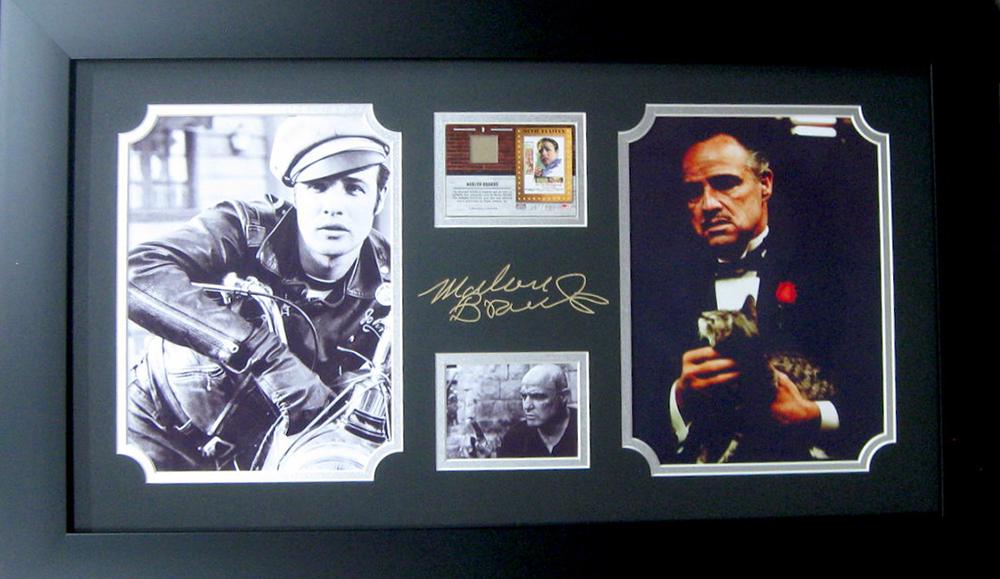 *Rare Marlon Brando with Authentic Swatch of Clothing: Gov. File: M-19618 *Rare Marlon Brando with Authentic Swatch of Clothing Museum Framed Collage - Plate Signed Asset Type: CollectableShipping: $39.95. Item may be pick up only, or require additional s