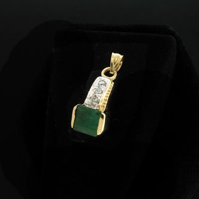 APP: 0.8k 14 kt. Gold, 0.71CT Emerald and 0.09CT D