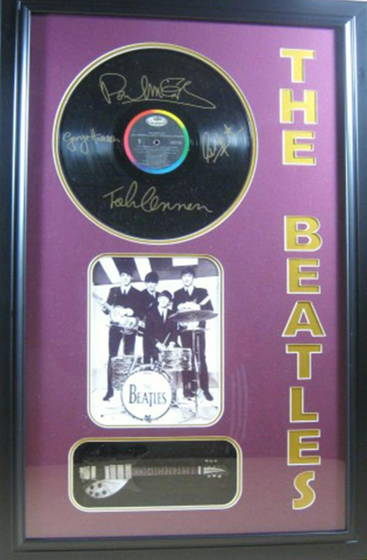 *Rare The Beatles Vinyl Record and Mini Guitar Museum: Gov. File: M-18936 *Rare The Beatles Vinyl Record and Mini Guitar Museum Framed Collage - Plate Signed Asset Type: Collectable Shipping: $39.95. Item may be pick up only, or require additional shippin