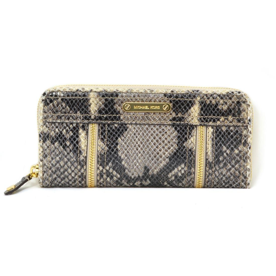 Brand New Michael Kors Moxley Dark Sand ZA Continental: Gov. File: T-13814 Brand New Michael Kors Moxley Dark Sand ZA Continental Embossed Leather Wallet Asset Type: Michael Kors Wallet Shipping: $29.95