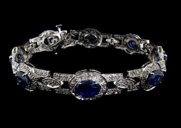 APP: 13.9k 14 kt. White Gold, 11.56CT Sapphire and