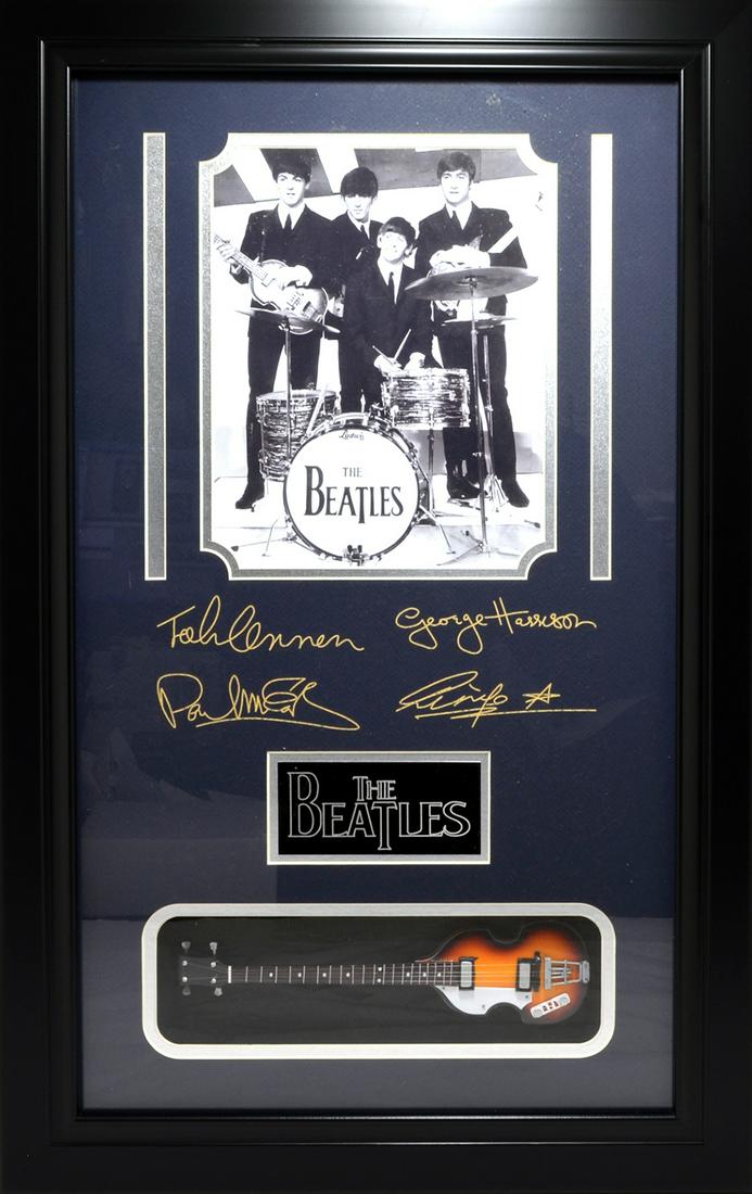 *Rare The Beatles Mini Guitar Museum Framed Collage -: Gov. File: M-21263 *Rare The Beatles Mini Guitar Museum Framed Collage - Plate Signed Asset Type: CollectableShipping: $39.95. Item may be pick up only, or require additional shipping charges due to w