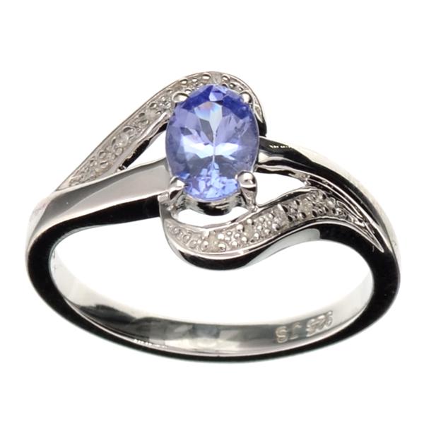 APP: 1.2k 0.75CT Tanzanite and Diamond Platinum Overlay: Gov. File: 53784 0.75CT Tanzanite and Diamond Platinum Overlay Sterling Silver Ring Retail Replacement Value: $1.2K Asset Type: Platinum Ring Shipping: $19.95