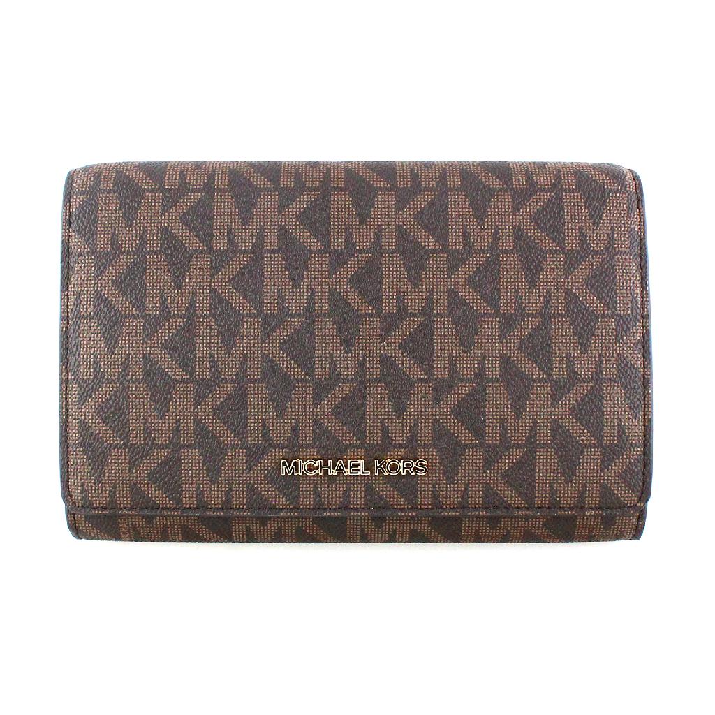 Gorgeous Brand New Never Used MICHAEL KORS "JET SET: Gov. File: T-18726 Gorgeous Brand New Never Used MICHAEL KORS '''' JET SET ITEM BROWN'''' LG MF XBODY CLUTCH . Tag Price $168.00 Asset Type: Purses Shipping: $29.95