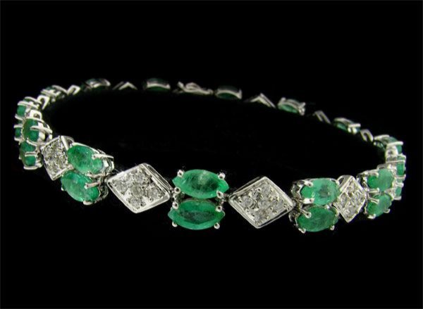 APP: 13.2k 14 kt. W Gold, 5.32CT Em. & Diamond Bracelet