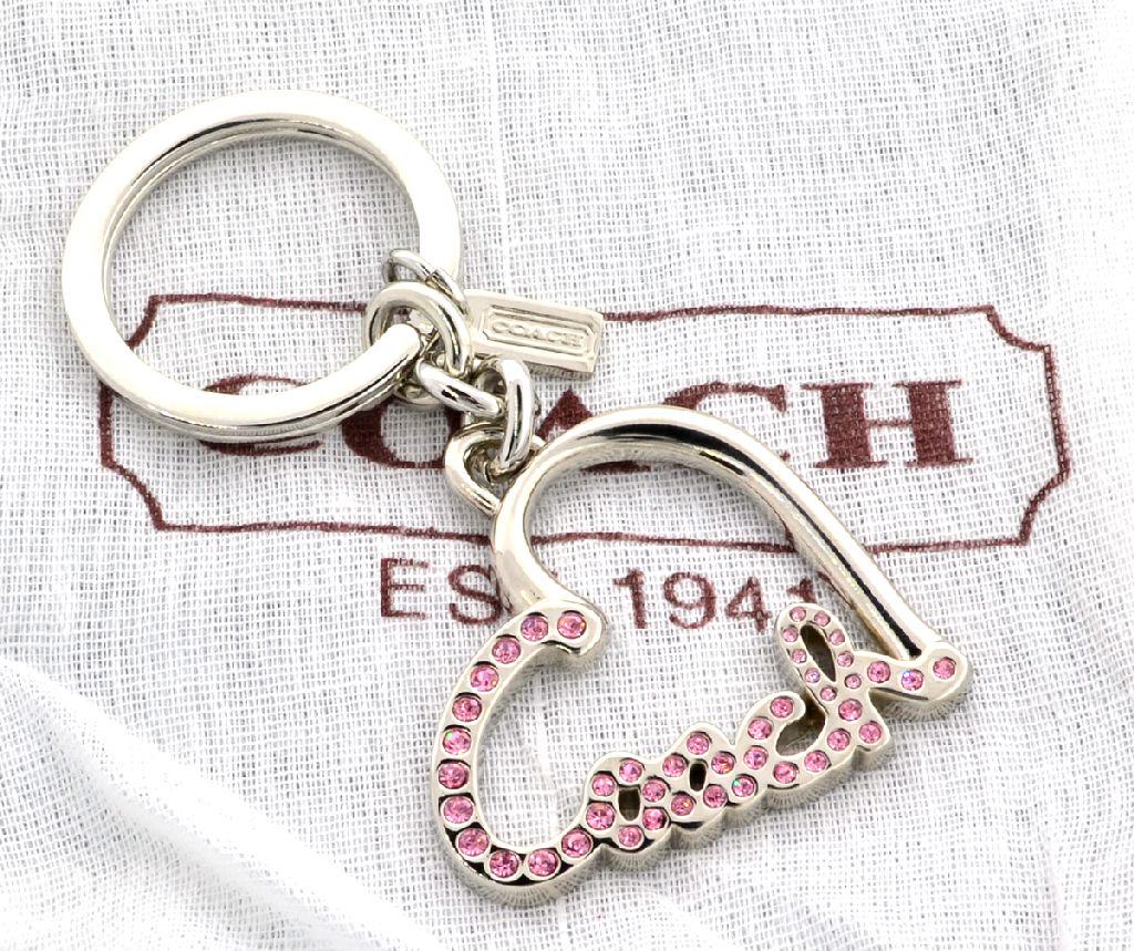 New Coach Pink Crystal Gems Pave Script Key Chain: Gov. File: T-05907 New Coach Pink Crystal Gems Pave Script Key Chain Asset Type: Coach Purse Shipping: $29.95