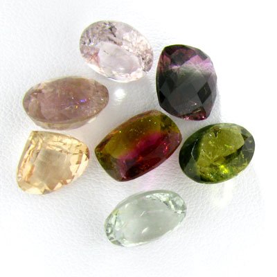 APP: 9.8k 24.17CT Mixed Tourmaline Gemstone: 24.17CT Mixed Tourmaline Gemstone - Thank you for viewing this Item. We hope that you are successful in your bidding. For over 30 years we have given the best possible customer service to our 1000's o