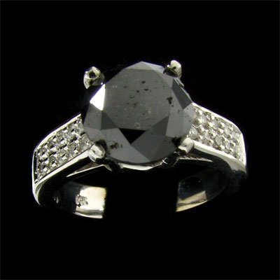 APP: 9.3k 14kt. W Gold 4.18CT Rare Black Diamond Ring: 14 kt. White Gold, 4.18CT Rare Black Diamond and Diamond Ring - Thank you for viewing this Item. We hope that you are successful in your bidding. For over 30 years we have given the best possible cust