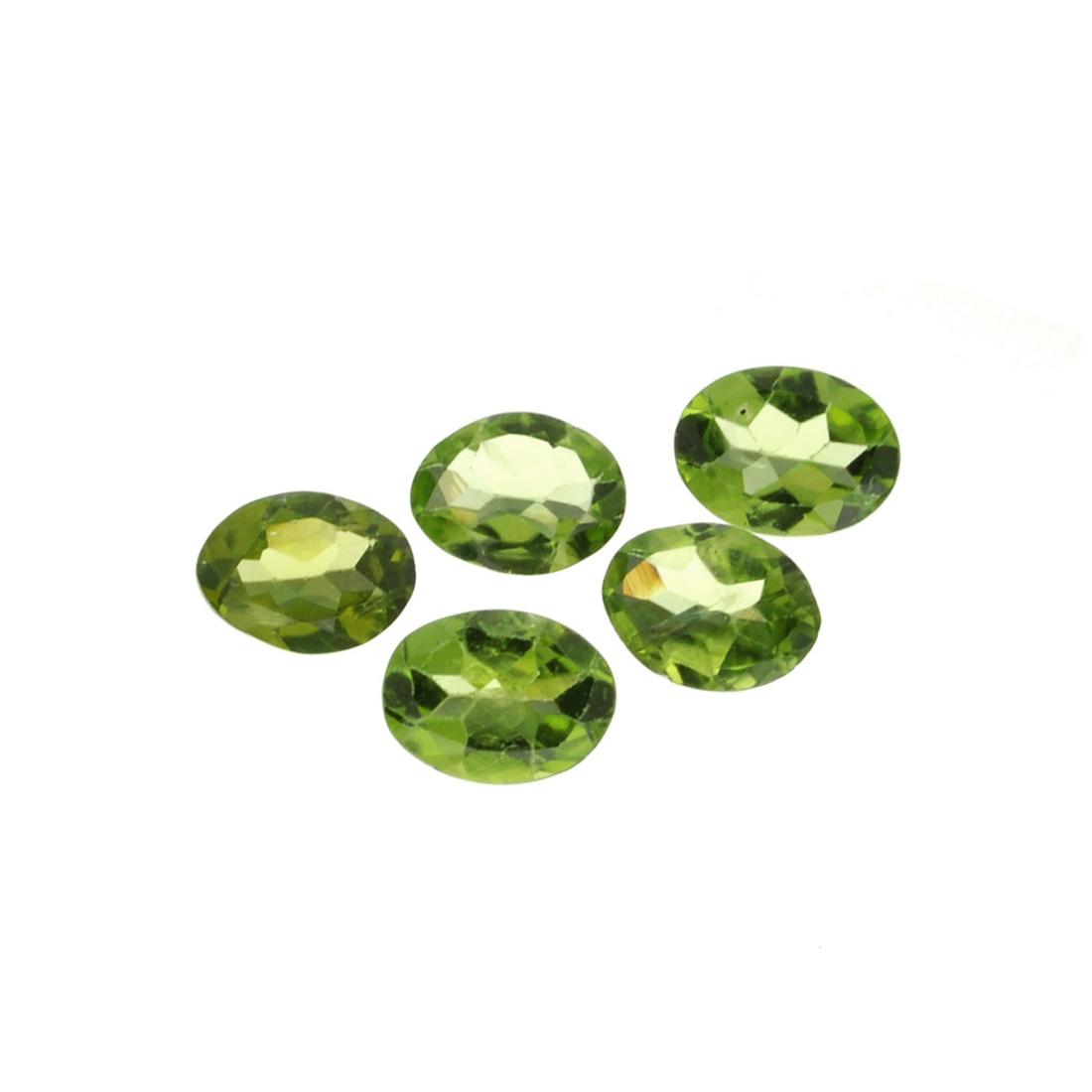 APP: 1.2k 6.06CT Oval Cut Peridot Parcel: Gov. File: H-06258 6.06CT Oval Cut Peridot Parcel Retail Replacement Value: $1.2K Asset Type: Peridot Parcel Shipping: $19.95