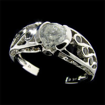 $5.8k 14kt W Gold 0.71CT Diamond & Black Diamond Ring: 14 kt. White Gold, 0.71CT Diamond and Rare Black Diamond Ring - Thank you for viewing this Item. We hope that you are successful in your bidding. For over 30 years we have given the best possible cust