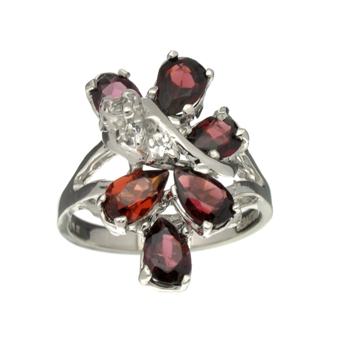 Fine Jewelry Designer Sebastian, Garnet And White Topaz: Gov. File: H-40332 Fine Jewelry Designer Sebastian, Garnet And White Topaz Sterling Silver Ring Asset Type: Sterling Silver Ring Shipping: $19.95