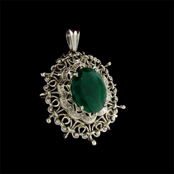 APP: 9.8k 9.10CT Emerald & Sterling Silver Pendant: 9.10CT Emerald and Sterling Silver Pendant - Appraisal Value: $9.7K - Bid with utmost confidence from GAA. We have been in business for over 35 years, and pride ourselves on perfect customer service. 