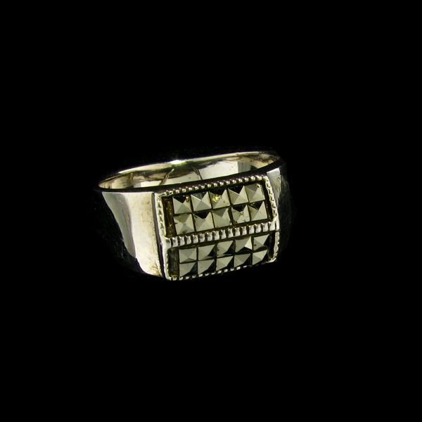 Marcasite & Sterling Silver Ring: Marcasite and Sterling Silver Ring - Bid with utmost confidence from GAA. We have been in business for over 35 years, and pride ourselves on perfect customer service. For more informat
