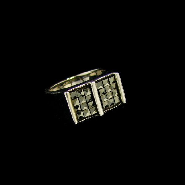 Marcasite & Sterling Silver Ring: Marcasite and Sterling Silver Ring - Bid with utmost confidence from GAA. We have been in business for over 35 years, and pride ourselves on perfect customer service. For more informat