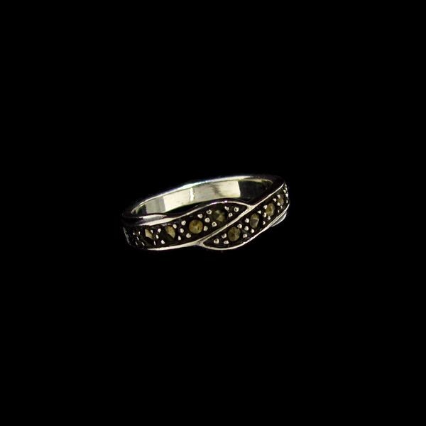 Marcasite & Sterling Silver Ring: Marcasite and Sterling Silver Ring - Bid with utmost confidence from GAA. We have been in business for over 35 years, and pride ourselves on perfect customer service. For more informat