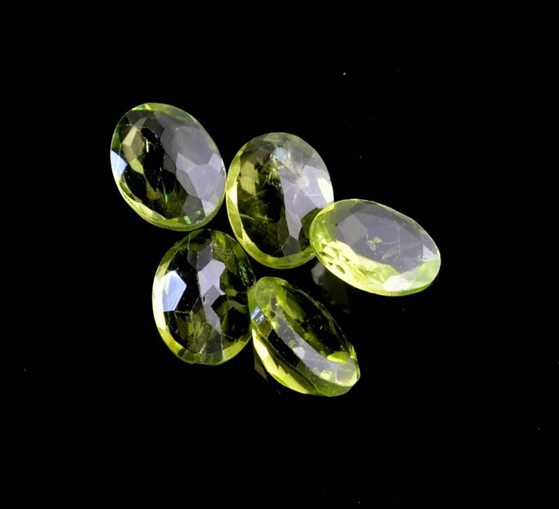 APP: 1.1k 5.69CT Oval Cut Green Peridot Parcel: Gov. File: H-07982 5.69CT Oval Cut Green Peridot Parcel Retail Replacement Value: $1.1K Asset Type: Peridot Parcel Shipping: $19.95