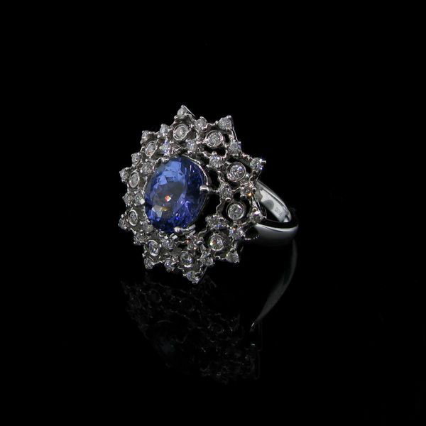 APP: 17k 18kt. White Gold, 1CT Tanzanite & Diamond Ring: 18 kt. White Gold, 1.77CT Tanzanite and Diamond Ring - Appraisal Value: $17.1K - Bid with utmost confidence from GovernmentAuction.com. We have been in business for over 35 years, and pride ourselves 