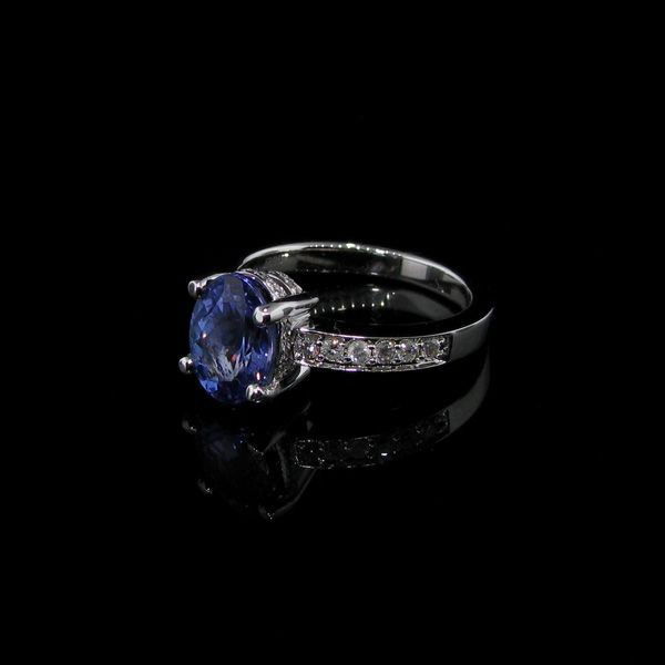 APP: 14k 14kt. White Gold, 2CT Tanzanite & Diamond Ring: 14 kt. White Gold, 2.06CT Tanzanite and Diamond Ring - Appraisal Value: $14.9K - Bid with utmost confidence from GovernmentAuction.com. We have been in business for over 35 years, and pride ourselves