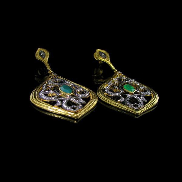 Green Gemstone & Sterling Silver Overlay Earrings: Green Gemstone and Sterling Silver Overlay Earrings - Bid with utmost confidence from GovernmentAuction.com. We have been in business for over 35 years, and pride ourselves on perfect customer service