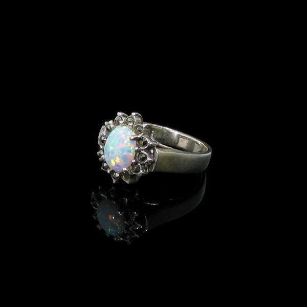 Opal, Marcasite & Sterling Silver Ring: Opal, Marcasite and Sterling Silver Ring - Bid with utmost confidence from GovernmentAuction.com. We have been in business for over 35 years, and pride ourselves on perfect customer service.