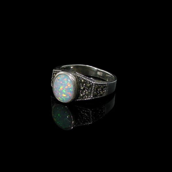 Opal, Marcasite & Sterling Silver Ring: Opal, Marcasite and Sterling Silver Ring - Bid with utmost confidence from GovernmentAuction.com. We have been in business for over 35 years, and pride ourselves on perfect customer service.