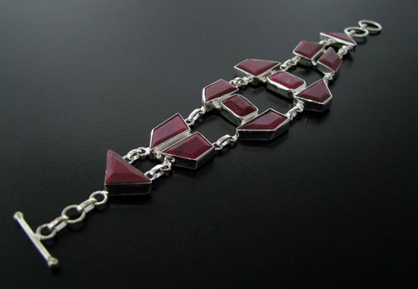 APP: 49.3k 94.50CT Ruby & Sterling Silver Bracelet: 94.50CT Ruby and Sterling Silver Bracelet - Appraisal Value: $49.2K - Bid with utmost confidence from GovernmentAuction.com. We have been in business for over 35 years, and pride ourselves on perfect 
