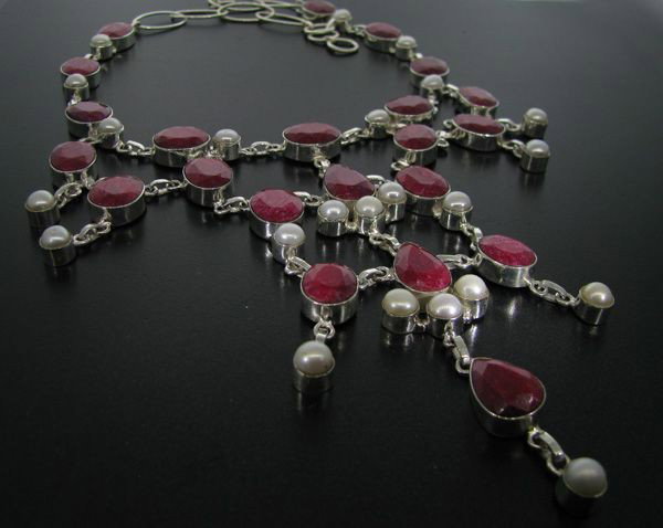 APP: 72.5k 185.92CT Ruby & Sterling Silver Necklace: 185.92CT Ruby and Sterling Silver Necklace - Appraisal Value: $72.4K - Bid with utmost confidence from GovernmentAuction.com. We have been in business for over 35 years, and pride ourselves on perfect