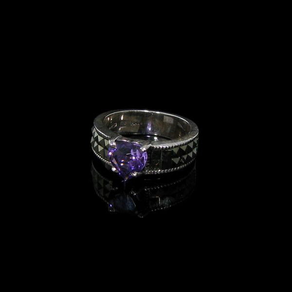 Amethyst, Marcasite & Sterling Silver Ring: Amethyst, Marcasite and Sterling Silver Ring - Bid with utmost confidence from GovernmentAuction.com. We have been in business for over 35 years, and pride ourselves on perfect customer service.