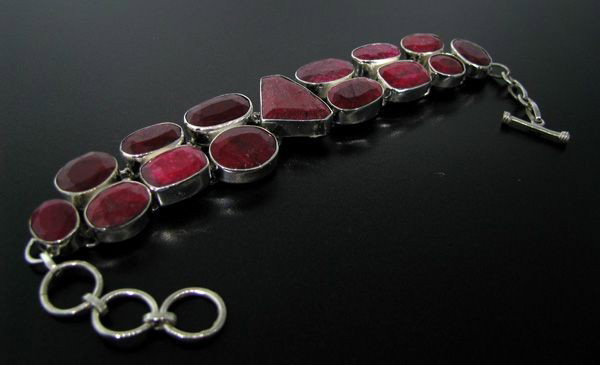 APP: 75.6k 146.19CT Ruby & Sterling Silver Bracelet: 146.19CT Ruby and Sterling Silver Bracelet - Appraisal Value: $75.5K - Bid with utmost confidence from GovernmentAuction.com. We have been in business for over 35 years, and pride ourselves on perfect