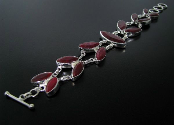 APP: 29.2k 54.85CT Ruby & Sterling Silver Bracelet: 54.85CT Ruby and Sterling Silver Bracelet - Appraisal Value: $29.2K - Bid with utmost confidence from GovernmentAuction.com. We have been in business for over 35 years, and pride ourselves on perfect 