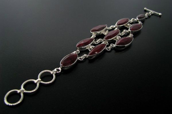 APP: 28.1k 50.85CT Ruby & Sterling Silver Bracelet: 50.85CT Ruby and Sterling Silver Bracelet - Appraisal Value: $28.1K - Bid with utmost confidence from GovernmentAuction.com. We have been in business for over 35 years, and pride ourselves on perfect 