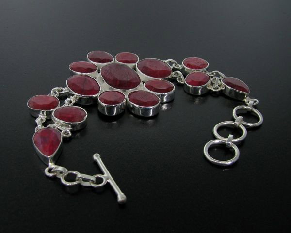 APP: 56.5k 108.16CT Ruby & Sterling Silver Bracelet: 108.16CT Ruby and Sterling Silver Bracelet - Appraisal Value: $56.4K - Bid with utmost confidence from GovernmentAuction.com. We have been in business for over 35 years, and pride ourselves on perfect