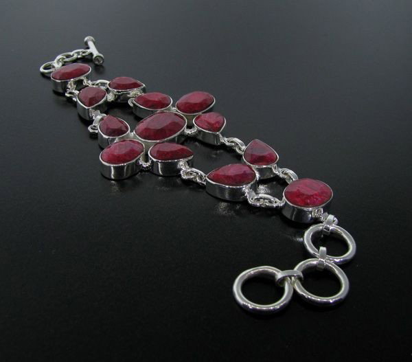 APP: 54.5k 104.58CT Ruby & Sterling Silver Bracelet: 104.58CT Ruby and Sterling Silver Bracelet - Appraisal Value: $54.5K - Bid with utmost confidence from GovernmentAuction.com. We have been in business for over 35 years, and pride ourselves on perfect