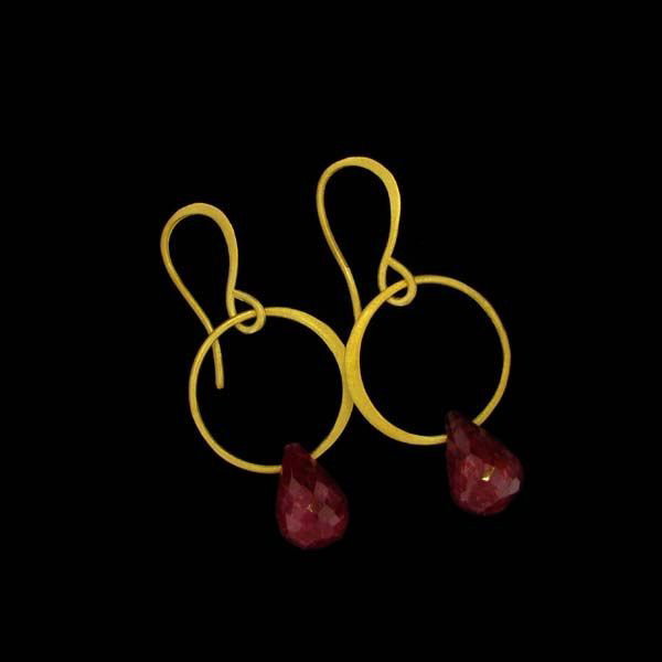 APP: 11k 24kt Gold 20CT Ruby & Sterling Silver Earring: 24 kt. Gold Overlay 20.68CT Ruby, and Sterling Silver Earrings - Appraisal Value: $11.1K - Bid with utmost confidence from GovernmentAuction.com. We have been in business for over 35 years, and pride 