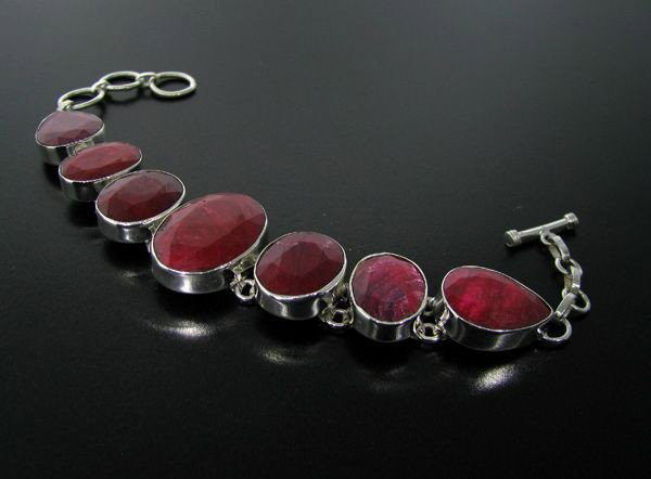 APP: 62.6k 120.98CT Ruby & Sterling Silver Bracelet: 120.98CT Ruby and Sterling Silver Bracelet - Appraisal Value: $62.5K - Bid with utmost confidence from GovernmentAuction.com. We have been in business for over 35 years, and pride ourselves on perfect
