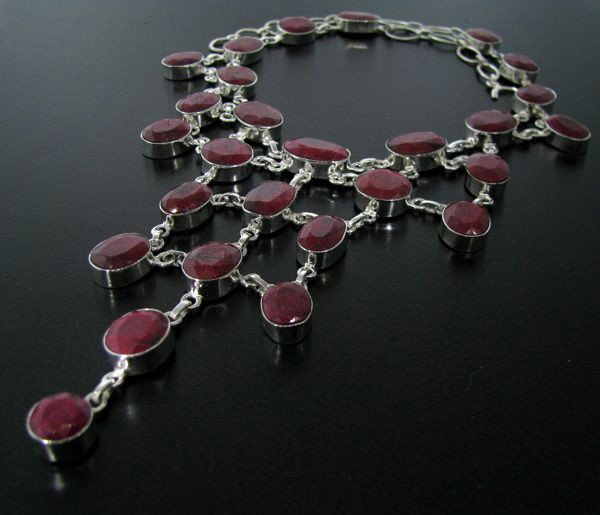 APP: 90k 244.41CT Ruby & Sterling Silver Necklace: 244.41CT Ruby and Sterling Silver Necklace - Appraisal Value: $89.9K - Bid with utmost confidence from GovernmentAuction.com. We have been in business for over 35 years, and pride ourselves on perfect