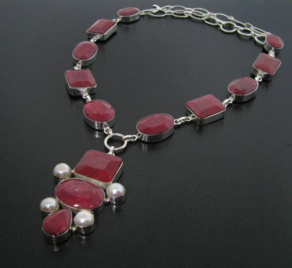 APP: 55.8k 148.03CT Ruby & Sterling Silver Necklace: 148.03CT Ruby and Sterling Silver Necklace - Appraisal Value: $55.7K - Bid with utmost confidence from GovernmentAuction.com. We have been in business for over 35 years, and pride ourselves on perfect