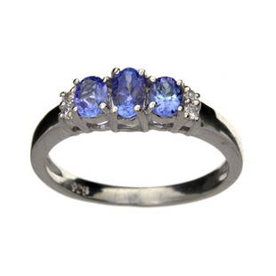 APP: 1.3k 0.54CT Tanzanite And Topaz Platinum Over Sterling Silver Ring: Gov. File: 88501 0.54CT Tanzanite And Topaz Platinum Over Sterling Silver Ring Retail Replacement Value: $1.3K Asset Type: Sterling Silver Ring Shipping: $19.95