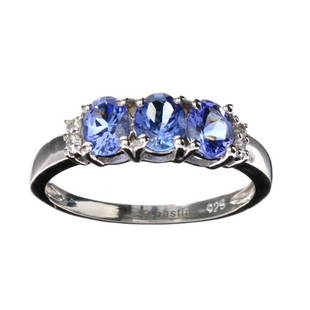 APP: 1.6k 1.25CT Tanzanite And Colorless Quartz Platinum Over Sterling Silver Ring: Gov. File: 91668 1.25CT Tanzanite And Colorless Quartz Platinum Over Sterling Silver Ring Retail Replacement Value: $1.6K Asset Type: Sterling Silver Ring Shipping: $19.95