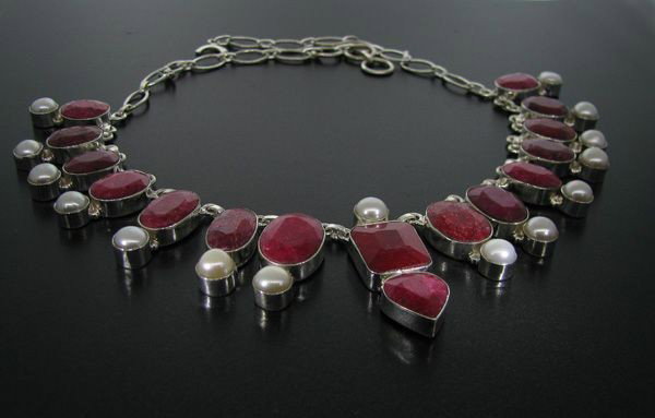 APP: 47.7k 121.03CT Ruby & Sterling Silver Necklace: 121.03CT Ruby and Sterling Silver Necklace - Appraisal Value: $47.6K - Bid with utmost confidence from GovernmentAuction.com. We have been in business for over 35 years, and pride ourselves on perfect