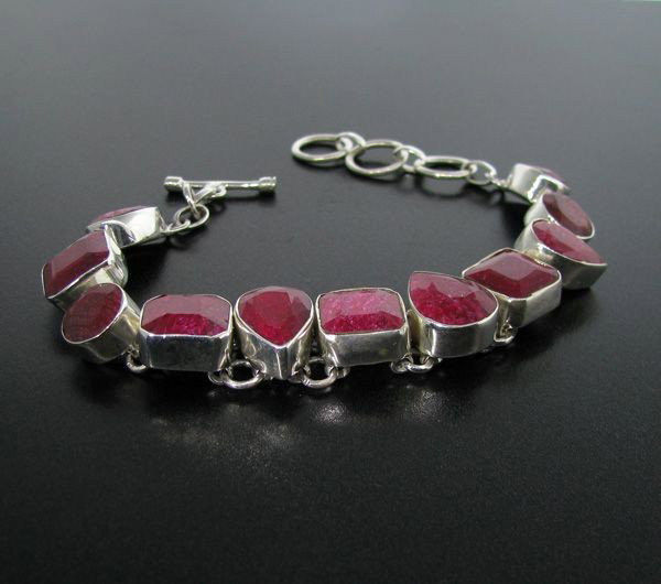 APP: 21.9k 79.11CT Ruby & Sterling Silver Bracelet: 79.11CT Ruby and Sterling Silver Bracelet - Appraisal Value: $21.8K - Bid with utmost confidence from GovernmentAuction.com. We have been in business for over 35 years, and pride ourselves on perfect 