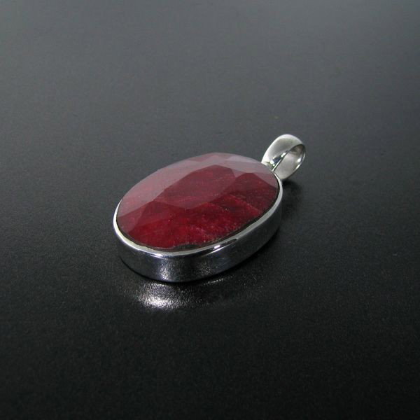 APP: 15k 40.51CT Ruby & Sterling Silver Pendant: 40.51CT Ruby and Sterling Silver Pendant - Appraisal Value: $14.9K - Bid with utmost confidence from GovernmentAuction.com. We have been in business for over 35 years, and pride ourselves on perfect c