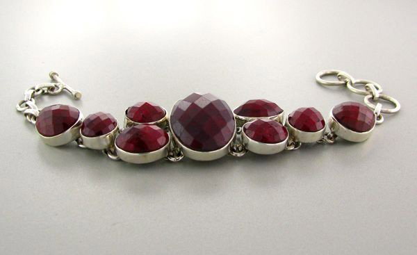 APP: 23.4k 85.18CT Ruby & Sterling Silver Bracelet: 85.18CT Ruby and Sterling Silver Bracelet - Appraisal Value: $23.4K - Bid with utmost confidence from GovernmentAuction.com. We have been in business for over 35 years, and pride ourselves on perfect 