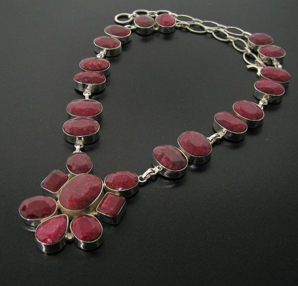 APP: 79.4k 214.75CT Ruby & Sterling Silver Necklace: 214.75CT Ruby and Sterling Silver Necklace - Appraisal Value: $79.3K - Bid with utmost confidence from GovernmentAuction.com. We have been in business for over 35 years, and pride ourselves on perfect