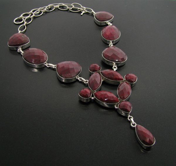 APP: 61.9k 238.97CT Ruby & Sterling Silver Necklace: 238.97CT Ruby and Sterling Silver Necklace - Appraisal Value: $61.8K - Bid with utmost confidence from GovernmentAuction.com. We have been in business for over 35 years, and pride ourselves on perfect